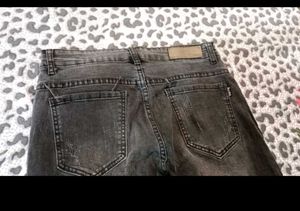 Ripped Graphic Jeans