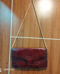 maroon vintage leather snakeprint bag