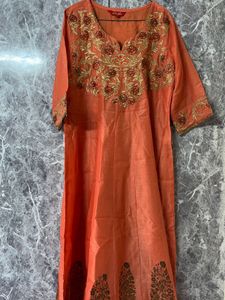 Elegant Orange Kurta Set with Embroidered Details