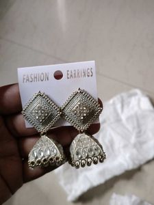 Off White Diamond Jhumkass With Malaa