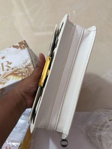 Miss Dior Clutch sling bag