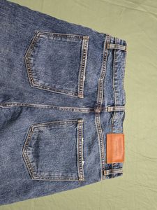 ZARA Ripped Knee Jeans