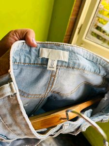 H&amp;M light blue washed ripped shorts