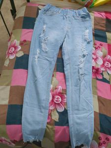 Ripped Light Blue Jeans