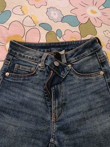 Cross-Waist Denim Jeans