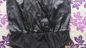 blacksatinbodysuit with a collared, wrap-style Top