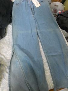Light Wash Wide Leg Jeans With A Slit