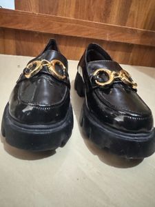 Black Loafers with Gold Detail