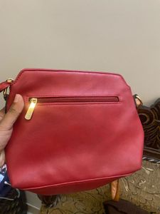 Woman’s Cherry Colored Bag