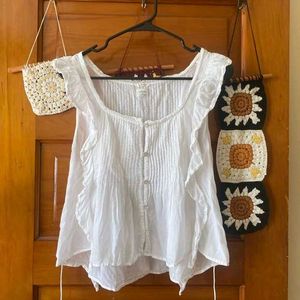 Ruffled Sleeveless White Top