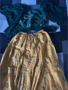 green sequins top with yellow skirt
