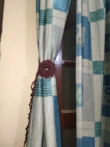 curtain holder brown colour