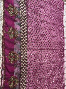 Heavy Purple Stone And Sequin Work Net Saree