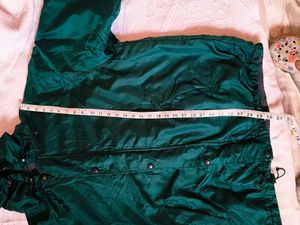 Green hooded windbreaker
