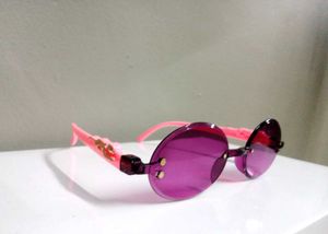 Pink Frameless Sunglasses