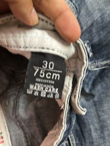 Ripped Blue Denim Jeans