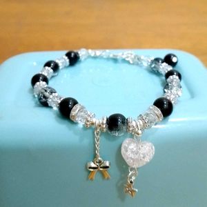 Beaded Silver Eclipse Charm Bracelet