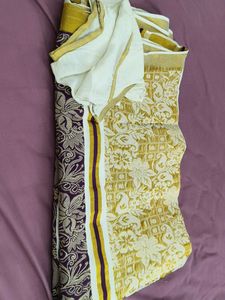 Kerala Kasavu Saree with Floral Design