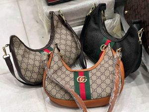 GUCCI NEW IMPORTED HALF MOON LOOK SLING BAG