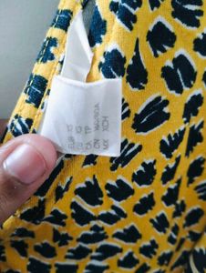 H&amp;M yellow and Black animal print skater dress.