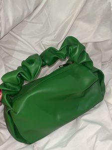 green scrunched hand bag