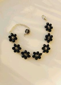 Two Bracelets And One Earrings