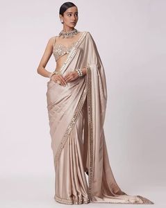 Elegant Beige Embellished Saree