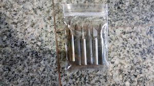 Two Soldering Tools And Iron Tips