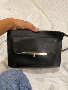 black sling bag