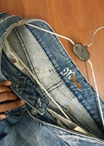 Ripped Denim Shorts
