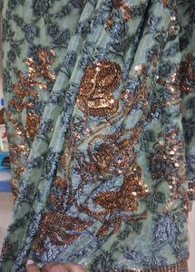 tissue type olive green chamki work saree