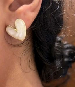 women white heart earrings