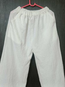 White textured wide-leg pants