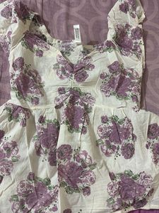 It Is Peplum Top With Rose Print