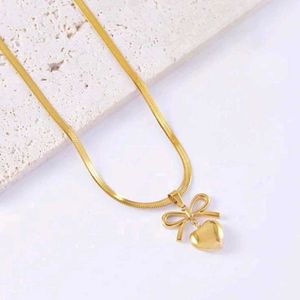 Trendy Gold Plated Necklace With Bow And Heart🎀
