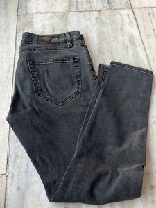 Distressed grey jeans