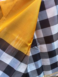 golden yellow and checkered border pure silk saree