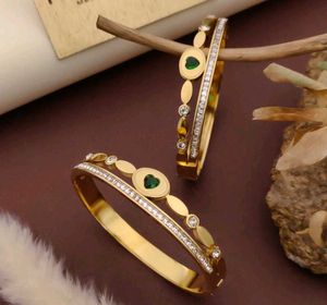 Gold Tone Flower Bangle Set