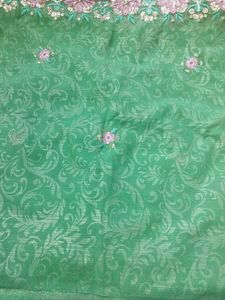 shimmery green two way net and Georgette saree