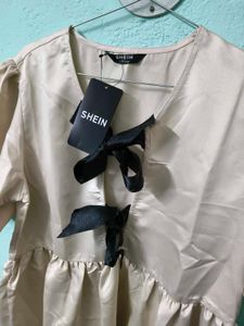 Cute Bow-Accented Mini Dress