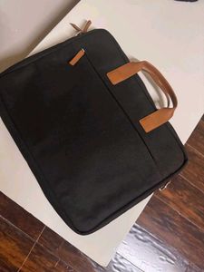 "Stylish Laptop Bag with Brown Leather Handle