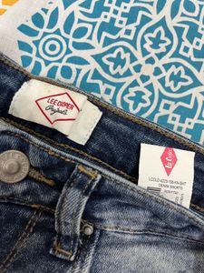 Distressed Denim Shorts