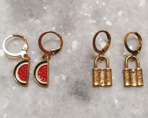 Combo of 2 beautiful Gold-toned small earrings and 1 red earring