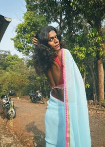 Light Blue Georgette Saree With Pink Border.