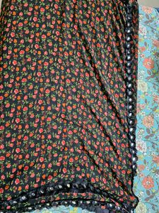 Floral Print Black Saree with red blouse