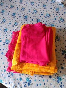 Yellow Kurti with Pink Salwar and Dupatta Set.
