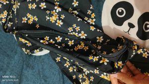 Black dress with yellow n white flowers