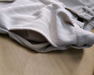 Sleeveless Textured Waistcoat With Wide Leg Pants