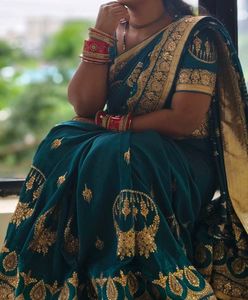 Elegant Teal Embroidered Saree