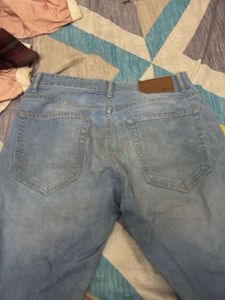 Ripped Light Wash Denim Jeans